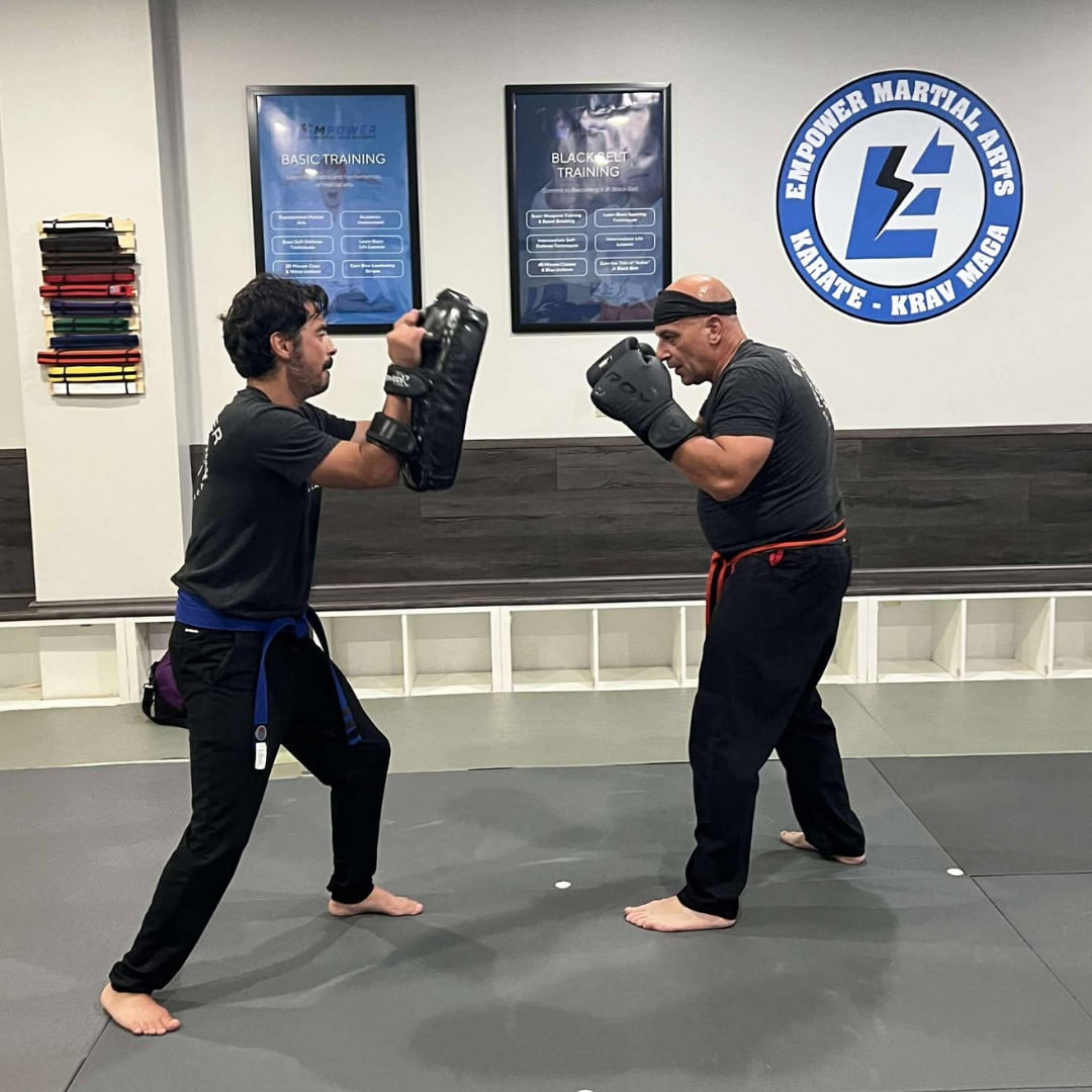 Two adults training Krav Maga at Empower Martial Arts in East Brunswick, NJ